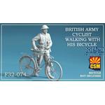British Army Cyclist walking with his bicycle