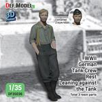 WW2 German Tank crew rest leaning against tank (2)