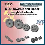M-30 Howitzer and limber weighted wheels