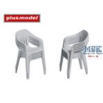 Stacked plastic chairs