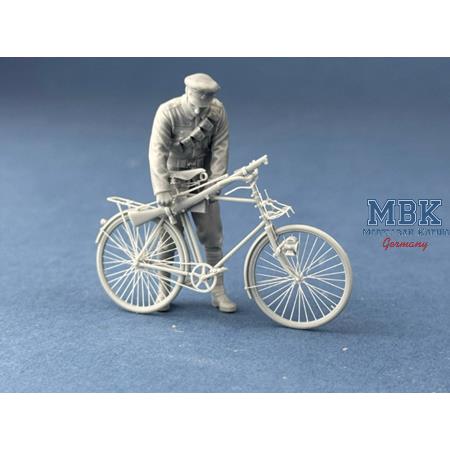 British Army Cyclist securing his rifle