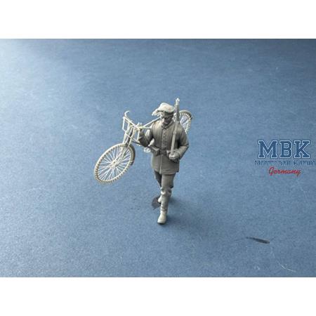 German Cyclist Carrying Bicycle