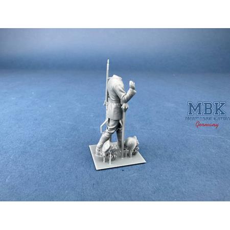 German Cyclist Carrying Bicycle