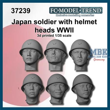 Japanese soldier heads wirth helmet WWII