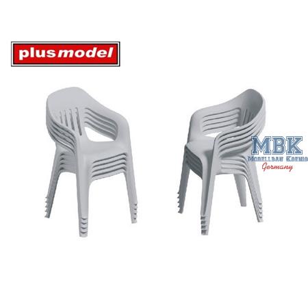 Stacked plastic chairs