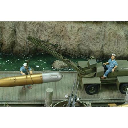 US sailors loading Torpedo WW2