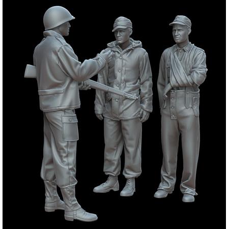 U.S. soldier with German prisoners