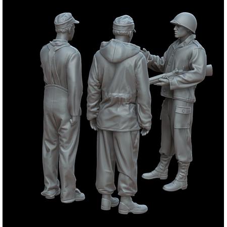 U.S. soldier with German prisoners
