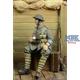 WWI British Infantryman sitting on a case