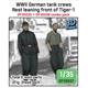WWII German tank crews set leaning front of Tank