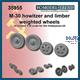 M-30 Howitzer and limber weighted wheels